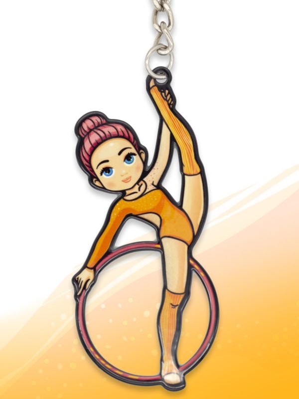 Брелок VERBA SPORT гимнастка с обручем Н (оранжевый) 8*3,7 см.